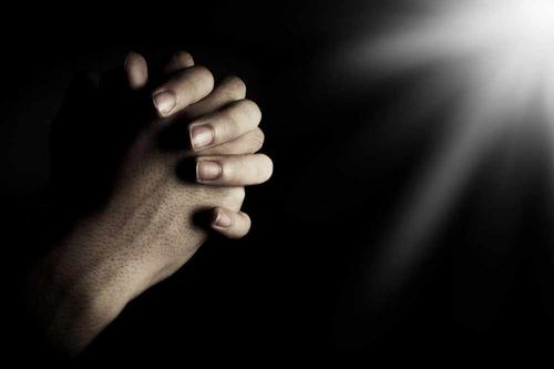 folded hands in prayer